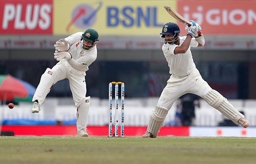 Pujara, Saha help India bring down first innings deficit 