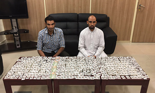 Two arrested over fake stamps