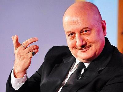 Anupam returns to India after productive trip to LA